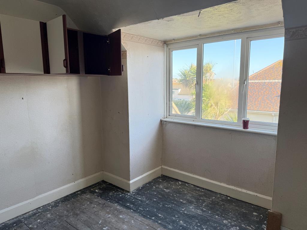 Lot: 180 - DETACHED MIXED USE PROPERTY AND LAND WITH POTENTIAL (STNC) - Bedroom 2 with window overlooking South Coast Road
